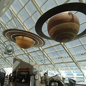 Adler Planetarium with planets hanging from the ceiling