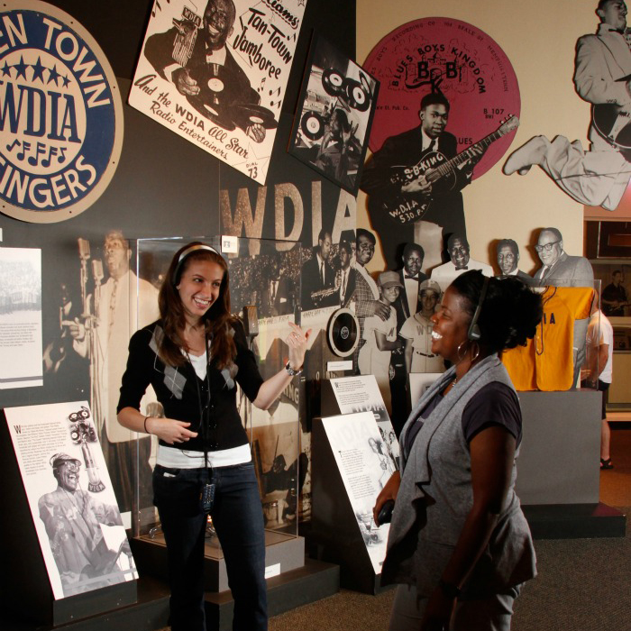 Tourists on self lead audio tour Rock N Soul Museum