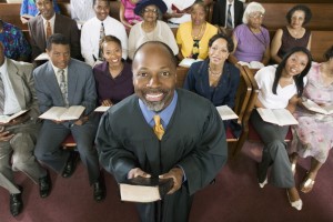 preacher and congregation portrait high angle view