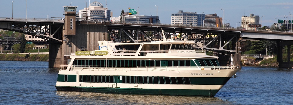 The Portland Spirit (1987 ship) facing south in the middle of the Willamette River just south of the Morrison Bridge, in Portland. Photo by Steve Morgan, 2012.