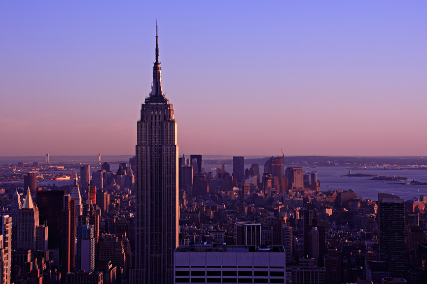 Aerial view of the Empire State Building at dusk, from the top of the Rockefeller Center - Manhattan, New York City, USA