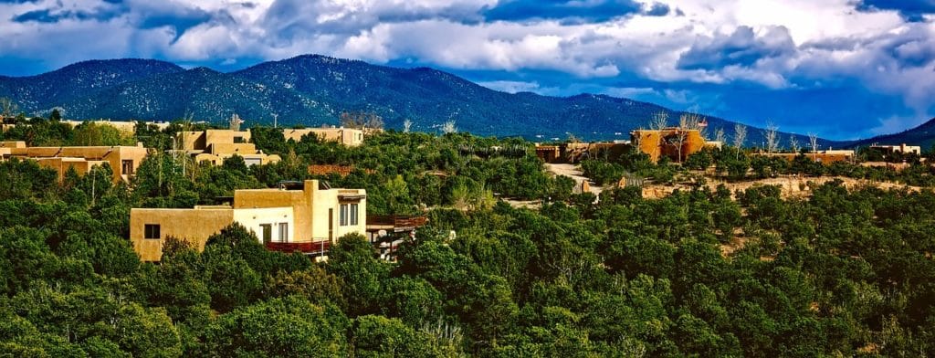 panoramic view of stone houses in forest