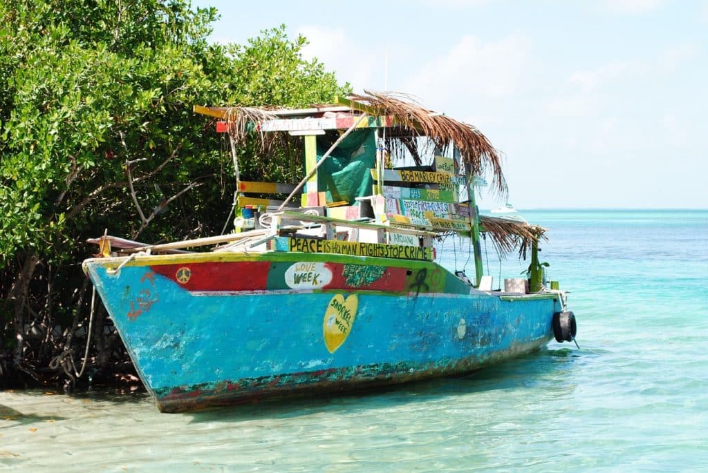 Boat covered in bright paint in Belize